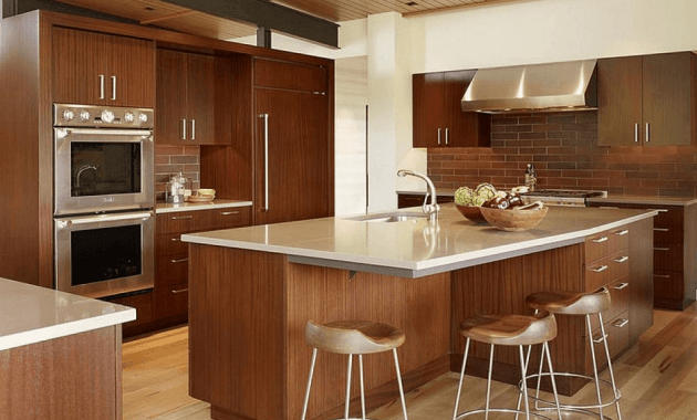 Brown large kitchen island with storage and seating Brown large kitchen island with storage and seating