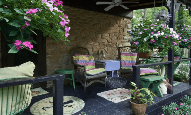 Hanging flower pots from ceiling porch