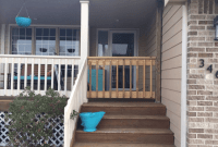 Wooden brown front porch gate Wooden brown front porch gate