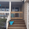 Wooden brown front porch gate