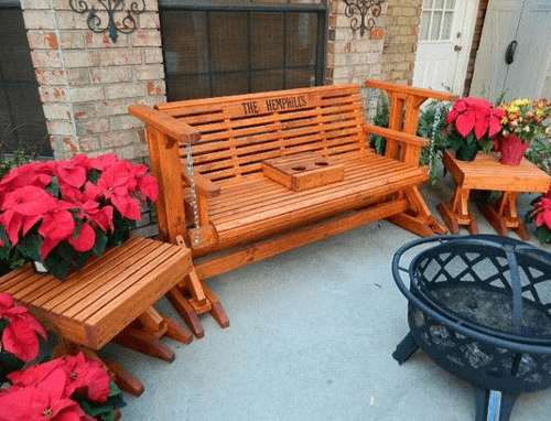 Front porch glider swing decoration with table and flower pots