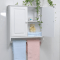White bathroom cabinets with towel bar
