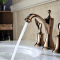 Bathroom sink faucet with long spout reach