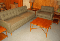 Brown couch with yellow walls and furniture Brown couch with yellow walls and furniture