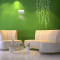 Green colour wall painting living room design ideas with white furniture and flooring