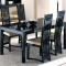 How to Decorate a Black Glass Dining Table