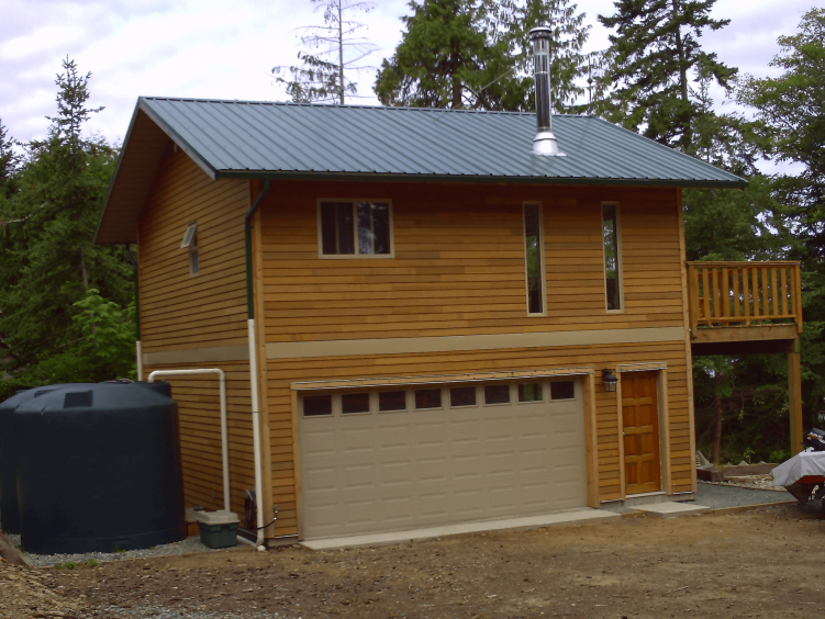 Wooden tiny house design with garage