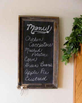 Kitchen menu board with chalk and blackboard