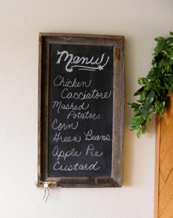 Kitchen menu board with chalk and blackboard