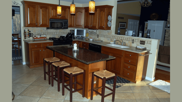 Unique design Kitchen Island with Breakfast Bar and Granite Top with Wax as decoration