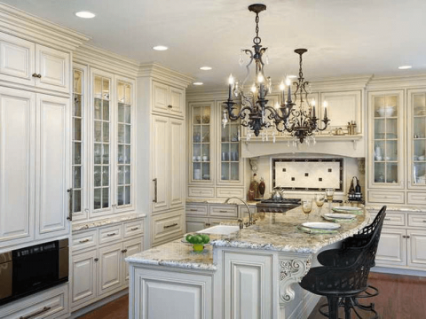 Chandeliers over kitchen islands hanging lights