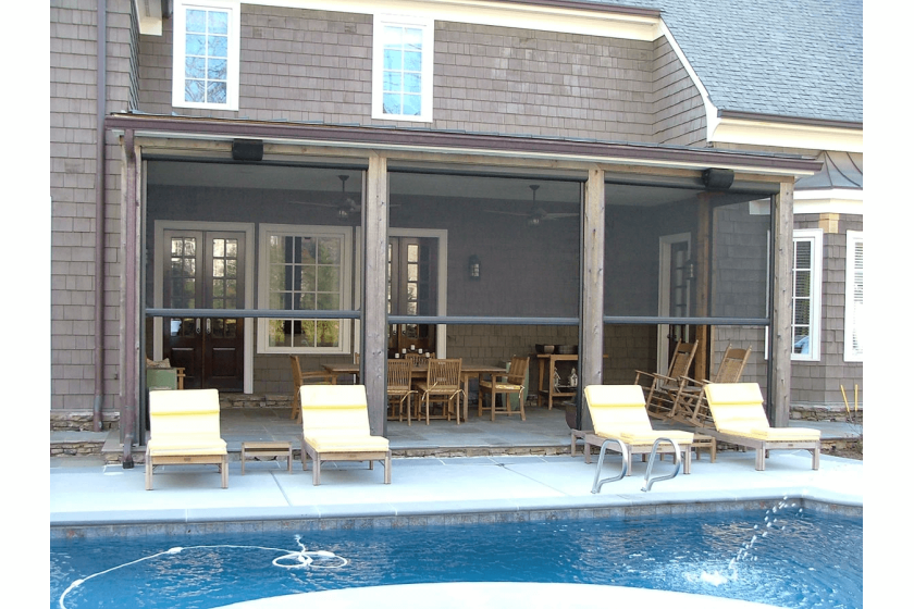 Motorized patio screen enclosures